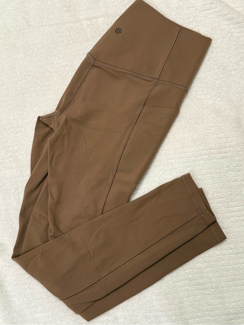 Athleta woman’s salutation stash pocket leggings  Pants in Brown sp